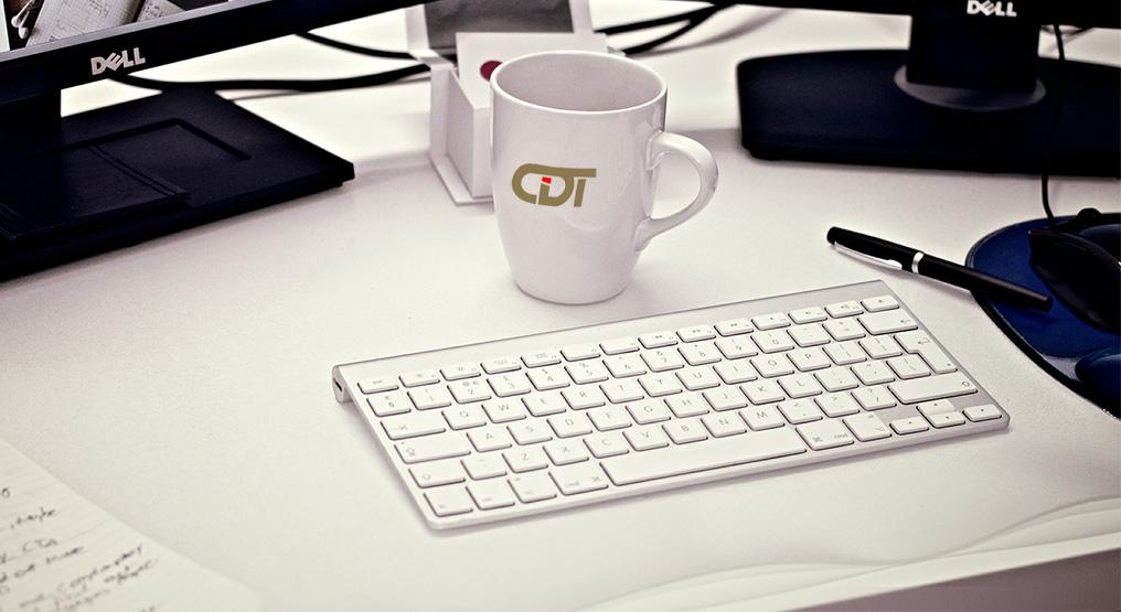 Image showing a CiDT branded mug on a desk with a keyboard